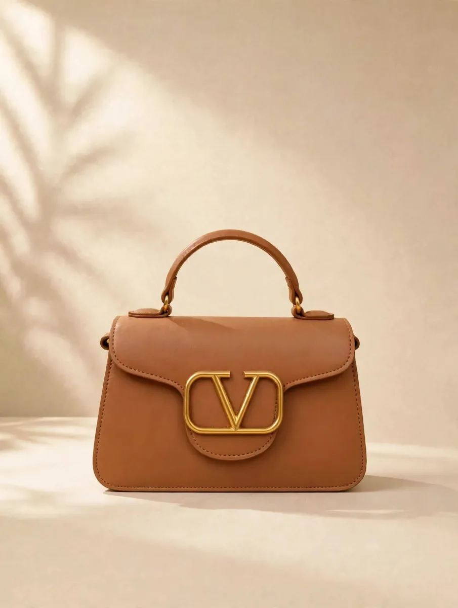 V-Clasp Tan Mini Handbag