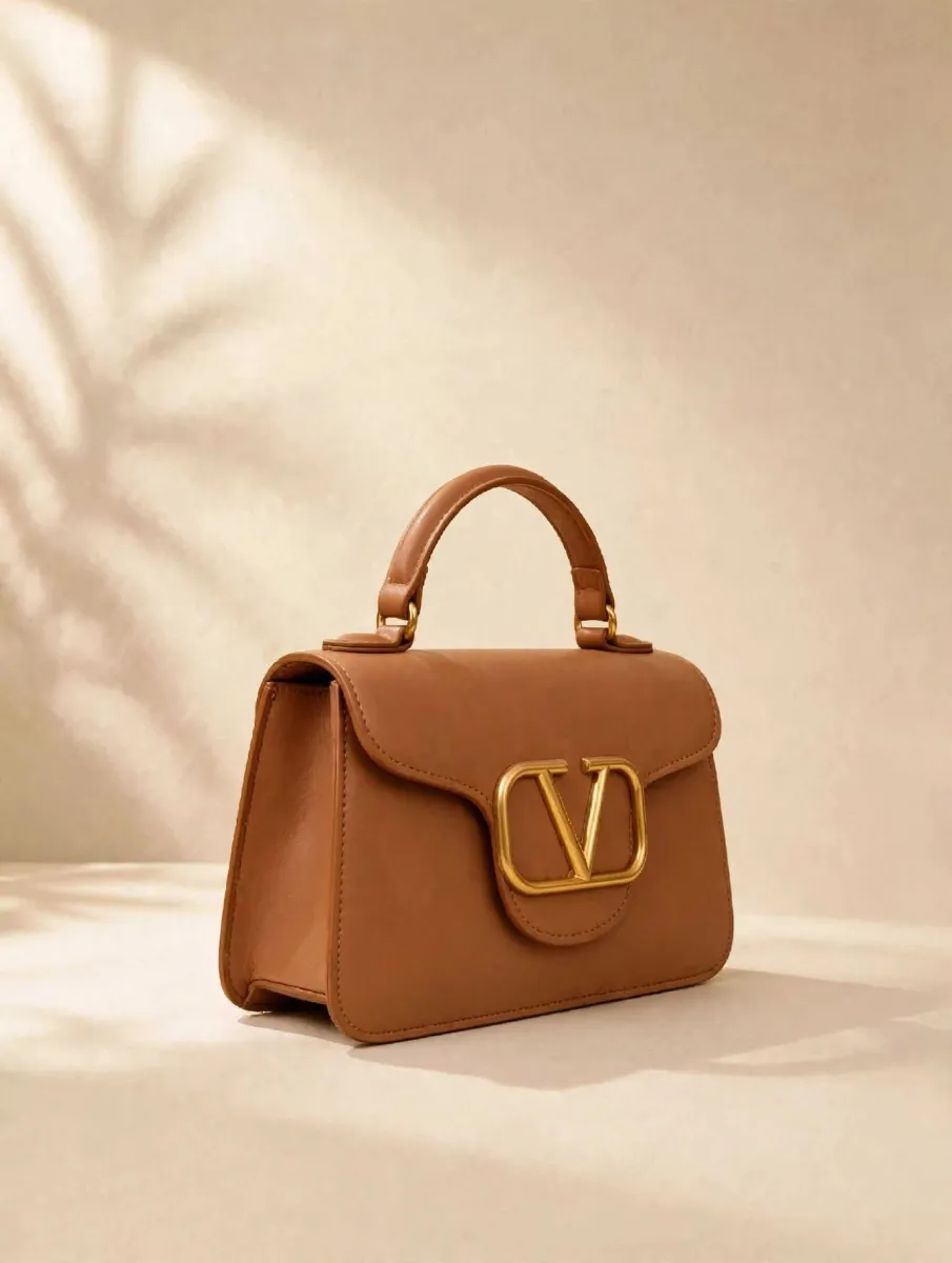 V-Clasp Tan Mini Handbag